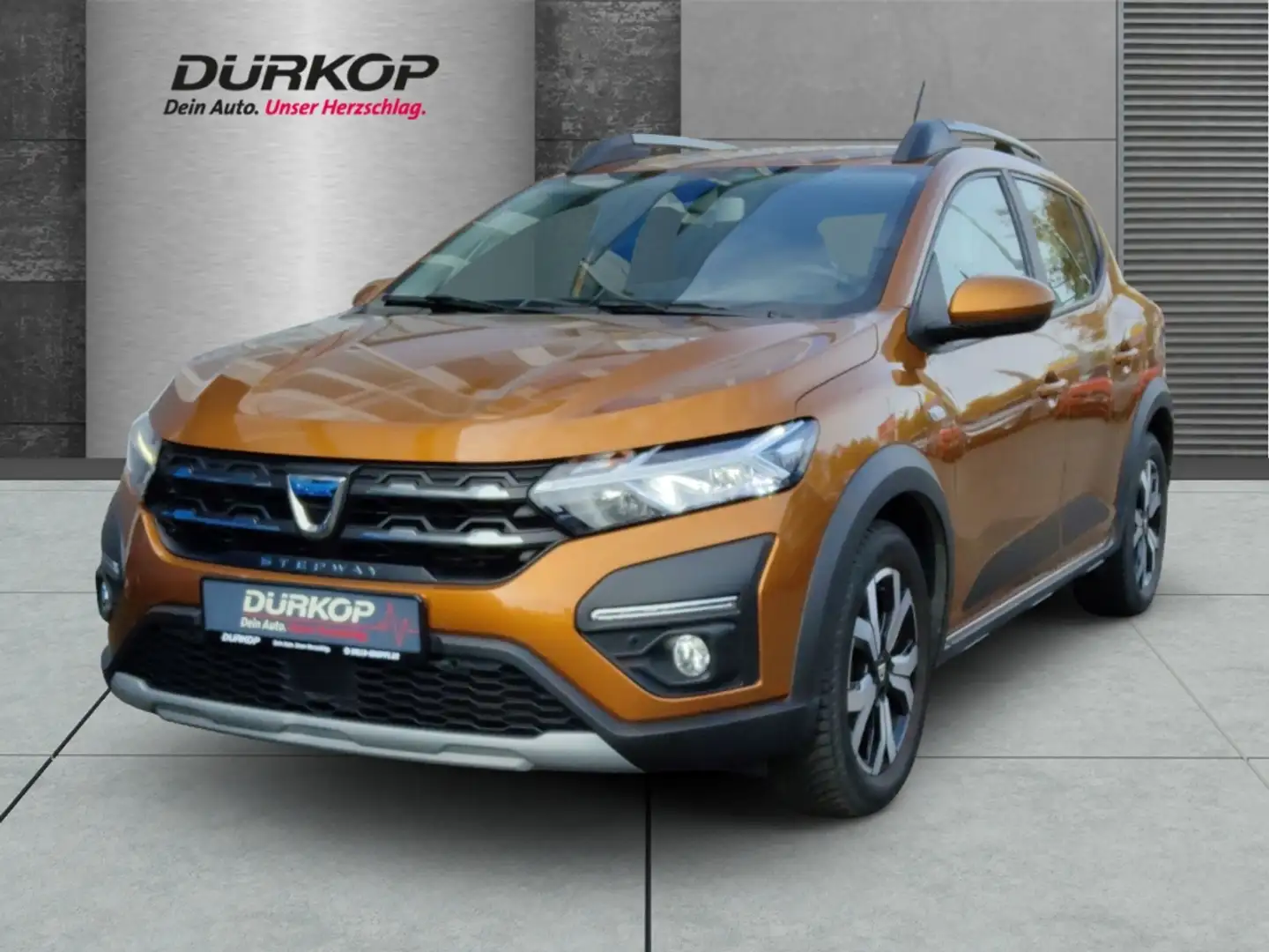 Dacia Sandero III 1.0 Stepway Comfort LED Klimaautom Fahrerprofi Orange - 1