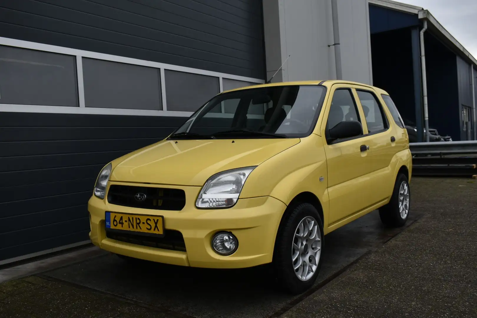 Subaru Justy 1.3-16V 4X4 lage km stand Geel - 1