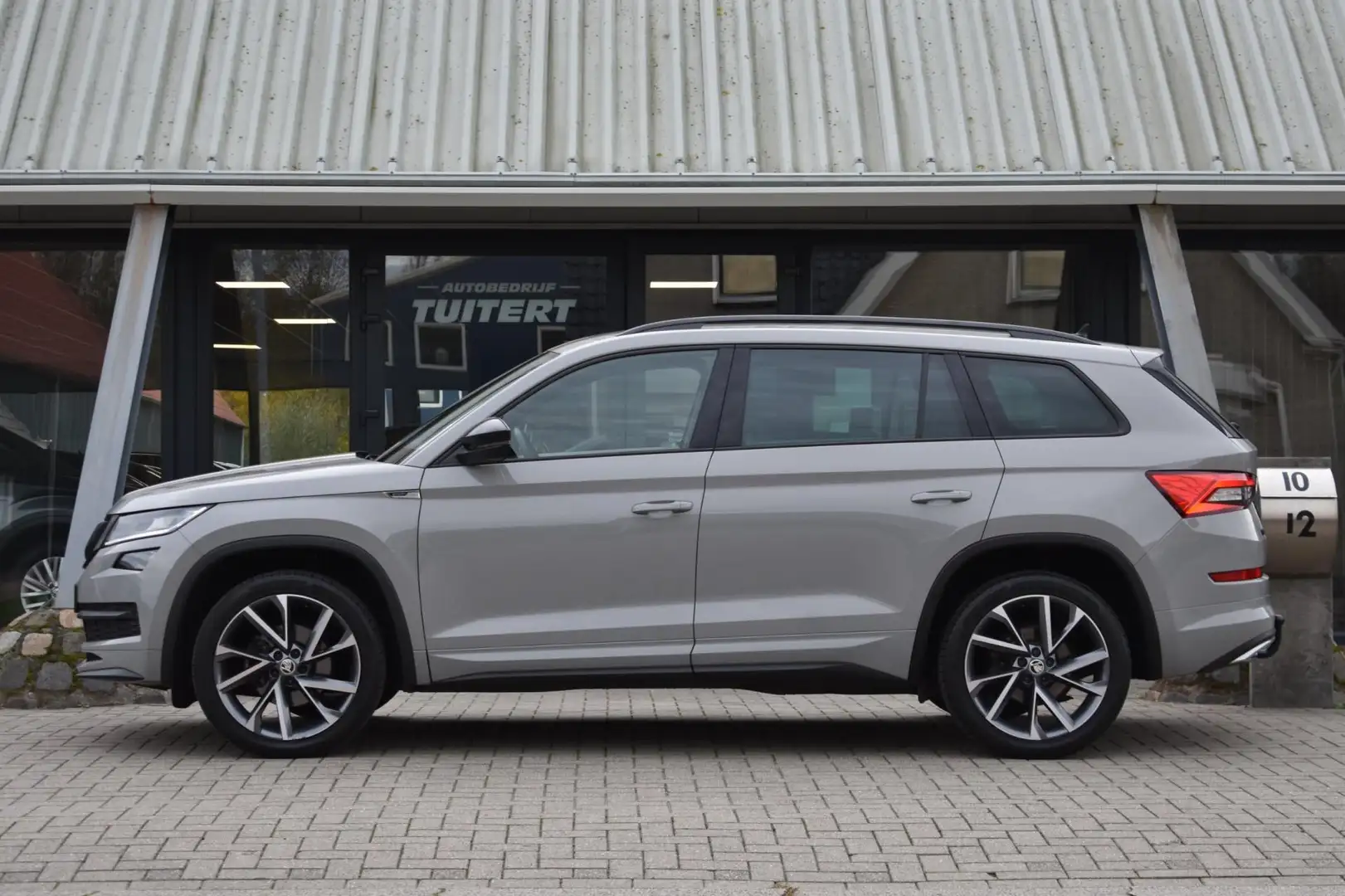 Skoda Kodiaq 1.5 TSI Sportline | TREKHAAK | CAMERA | NAP | ADAP Grijs - 2