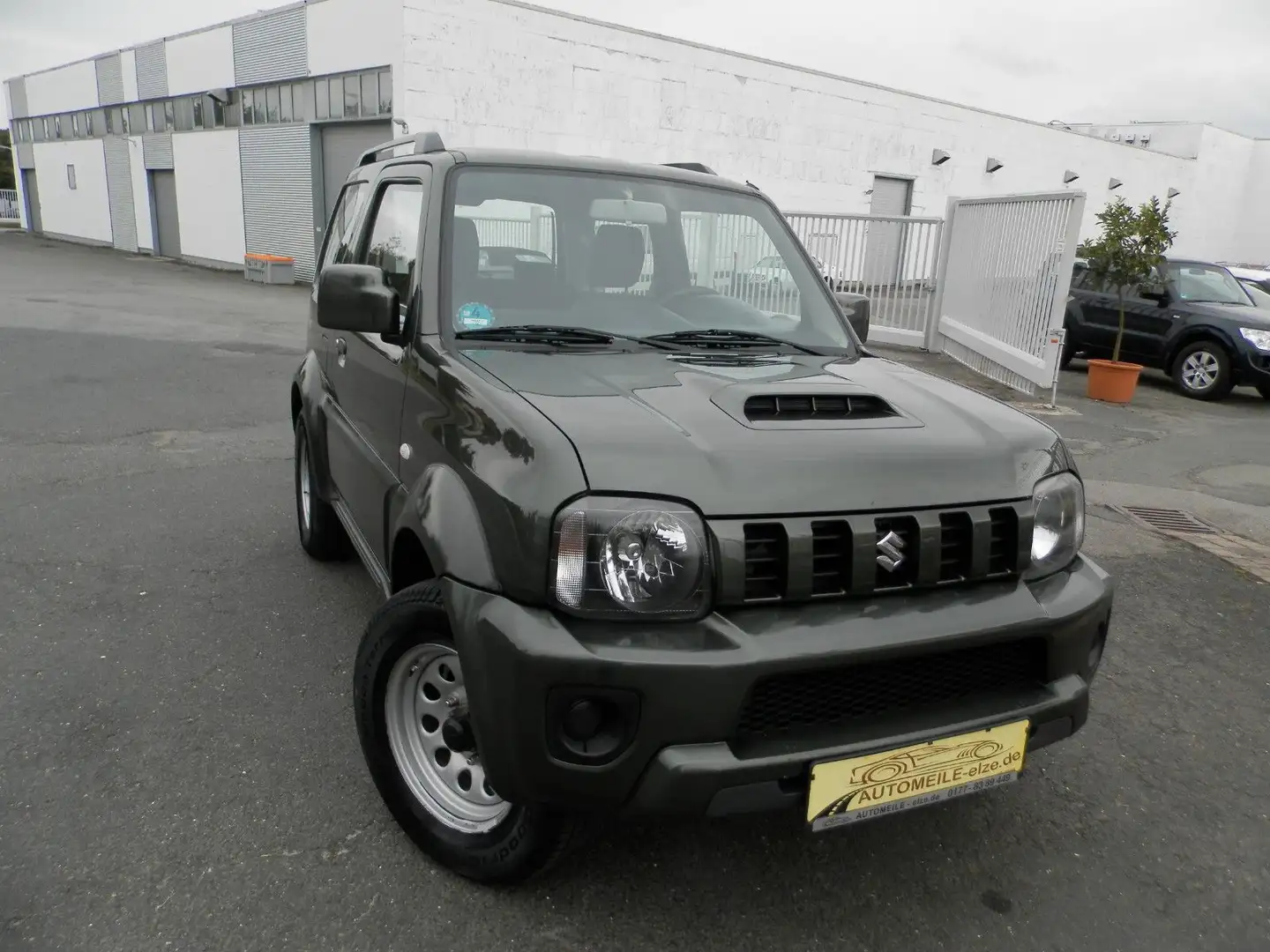 Suzuki Jimny Comfort Lim.*Automatik*Klima*7/2027*AHK Grün - 2