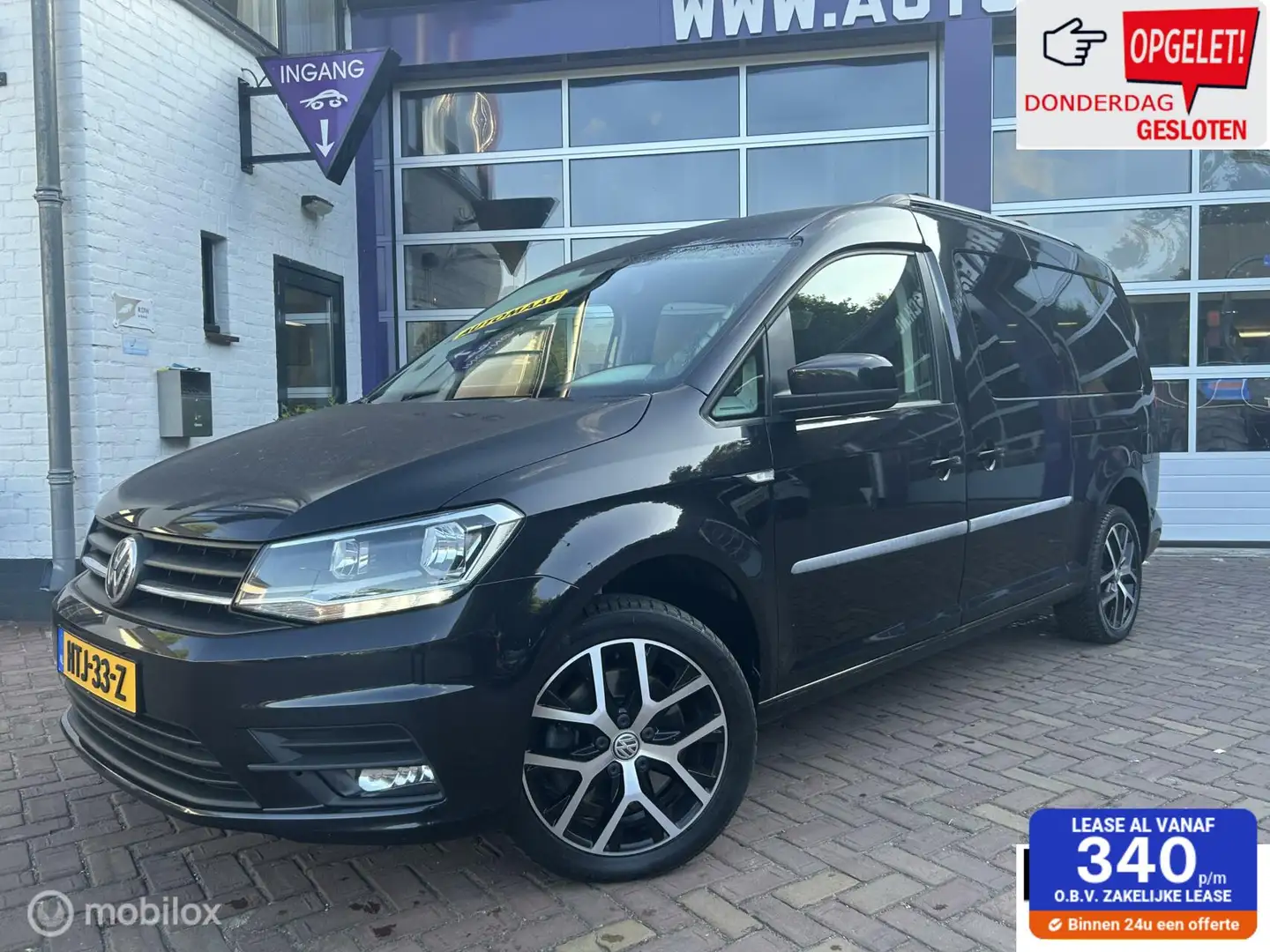 Volkswagen Caddy Maxi 1.4 TSI * AUTOMAAT * NAVI * TREKHAAK * Zwart - 1