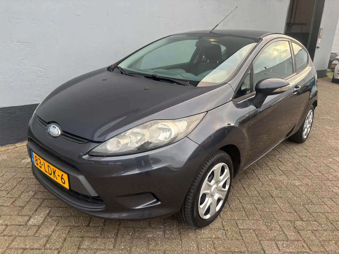 Ford Fiesta 1.25 Limited - Airco - Trekhaak Grijs - 1