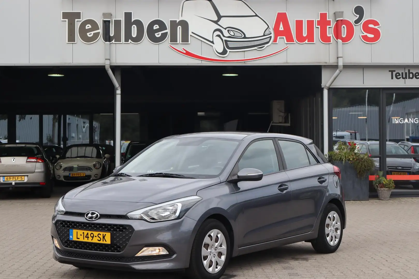 Hyundai i20 1.2 HP i-Motion Airco, Radio cd speler, Elektrisch Grijs - 1