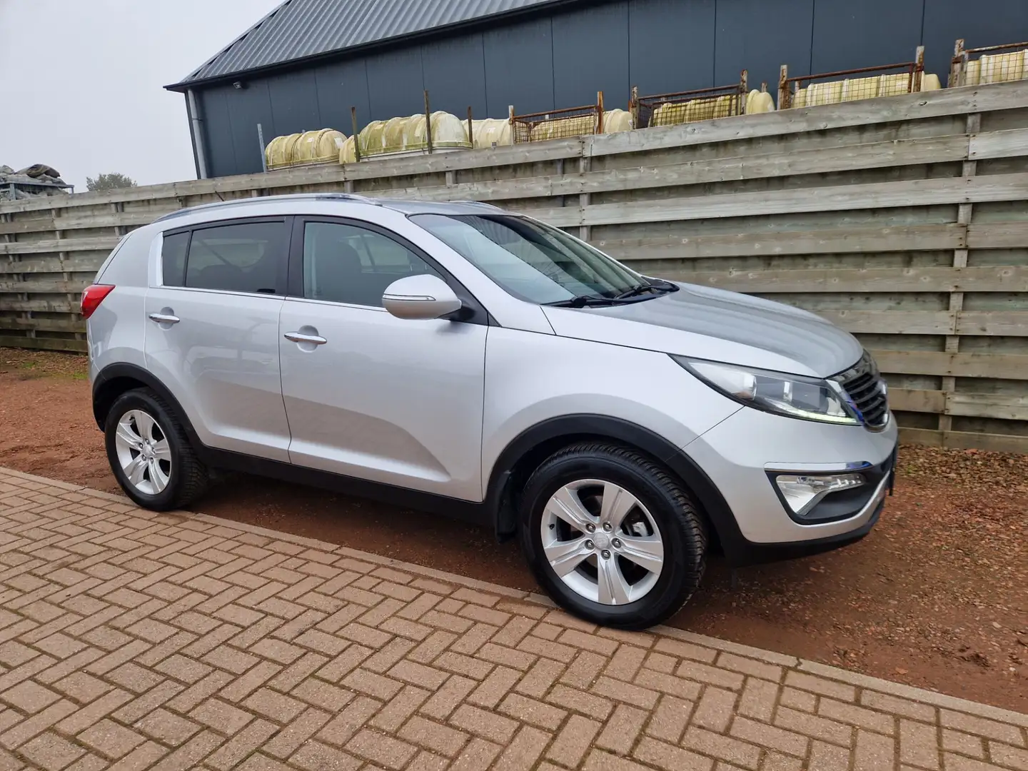 Kia Sportage 1.6 GDI Plus Pack Grijs - 1