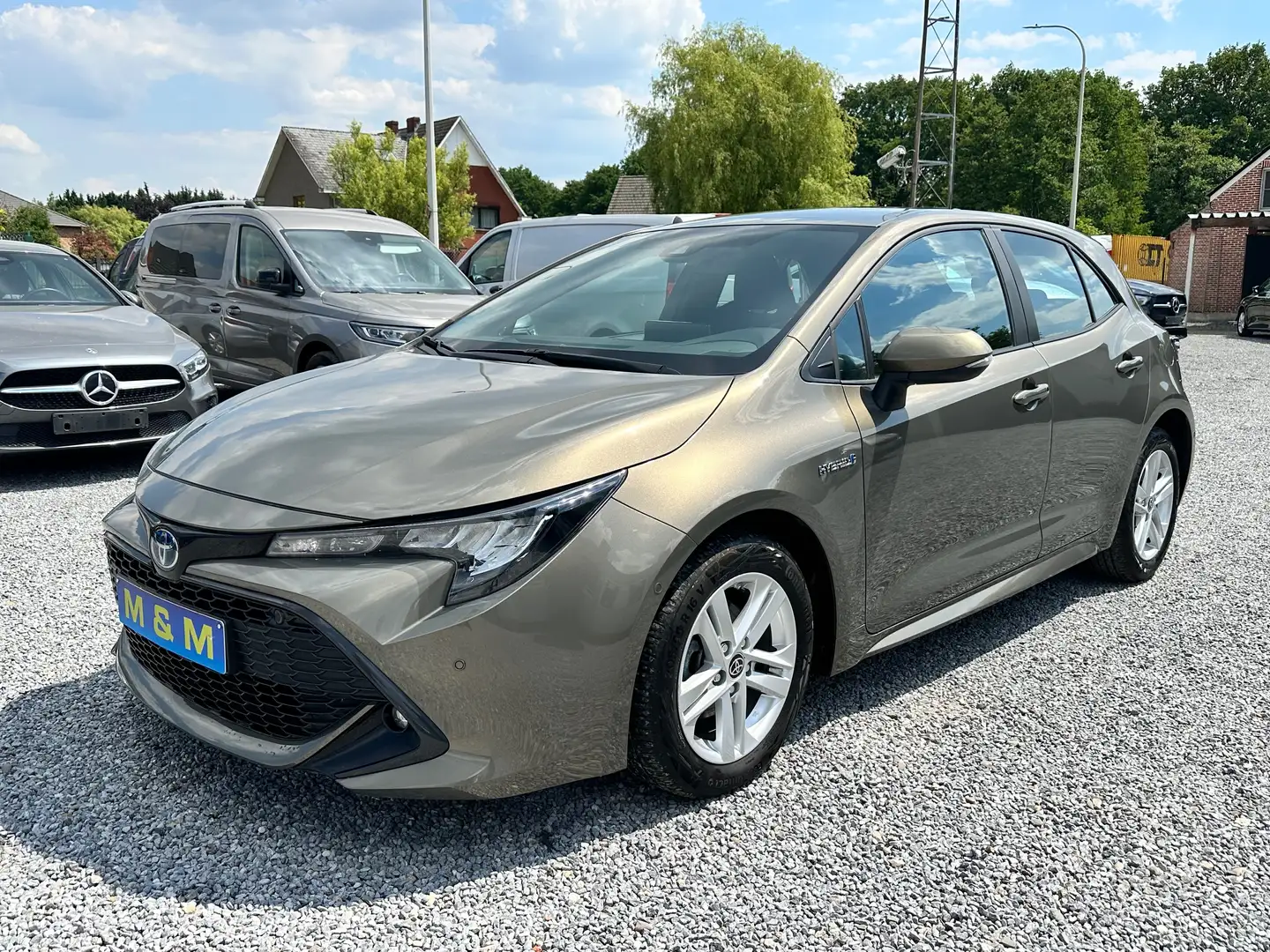 Toyota Corolla 1.8 Hybrid Dynamic GPF e-CVT ** 12 M Garantie ** Brun - 1