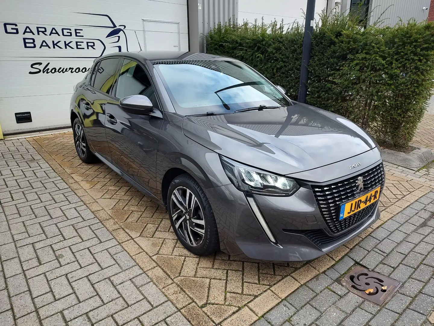 Peugeot 208 1.2 PureTech Allure Pack Automaat Trekhaak 360-Cam Gris - 1