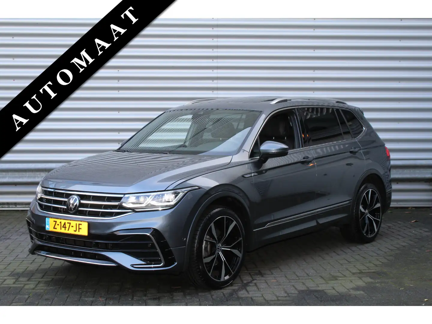 Volkswagen Tiguan Allspace 1.5 TSI 150pk R-Line 7p. DSG7 Panoramadak BTW Clim Grijs - 1
