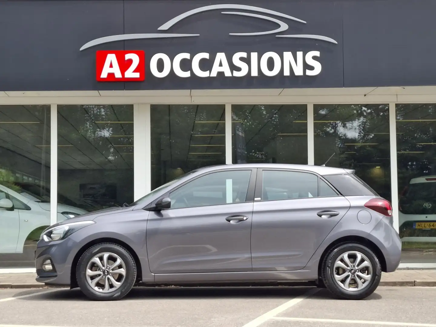 Hyundai i20 1.2 4 Cilinder 1e Eig.Cruise/Bluetooth/PDC/Stoel e Grijs - 2