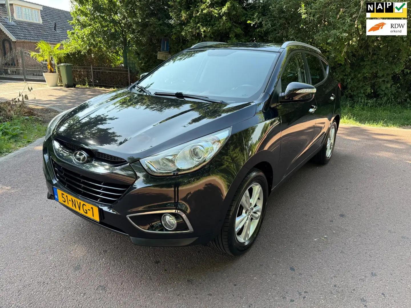 Hyundai iX35 2.0i Style / Airco / NAP / cruisecontrol / trekhaa Black - 1
