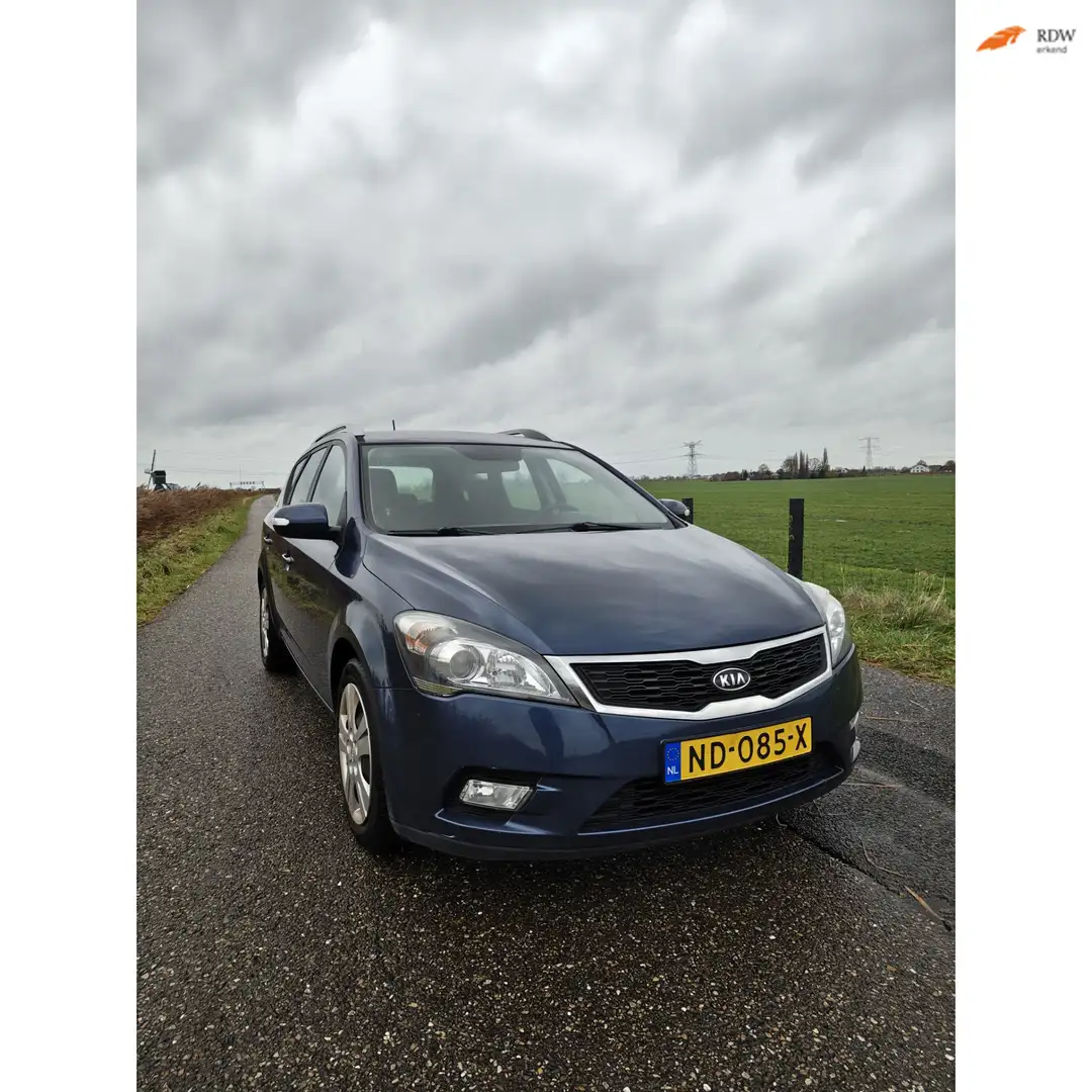 Kia Ceed / cee'd Sporty Wagon 1.6 CVVT X-tra - 5 DEURS - AIRCO - TR Blauw - 1