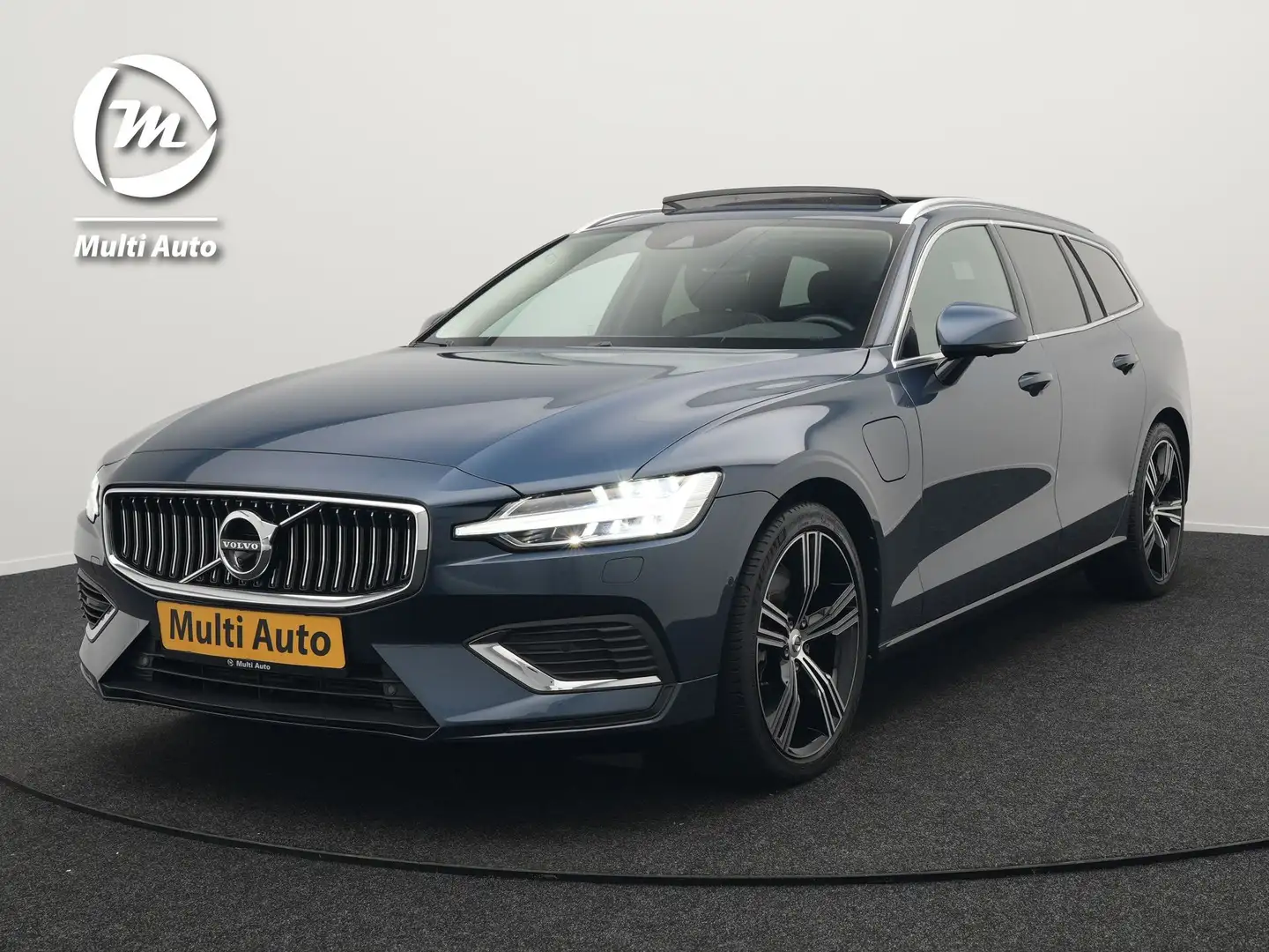 Volvo V60 T6 Recharge AWD Inscription Plug In Hybrid 340pk D Blauw - 1