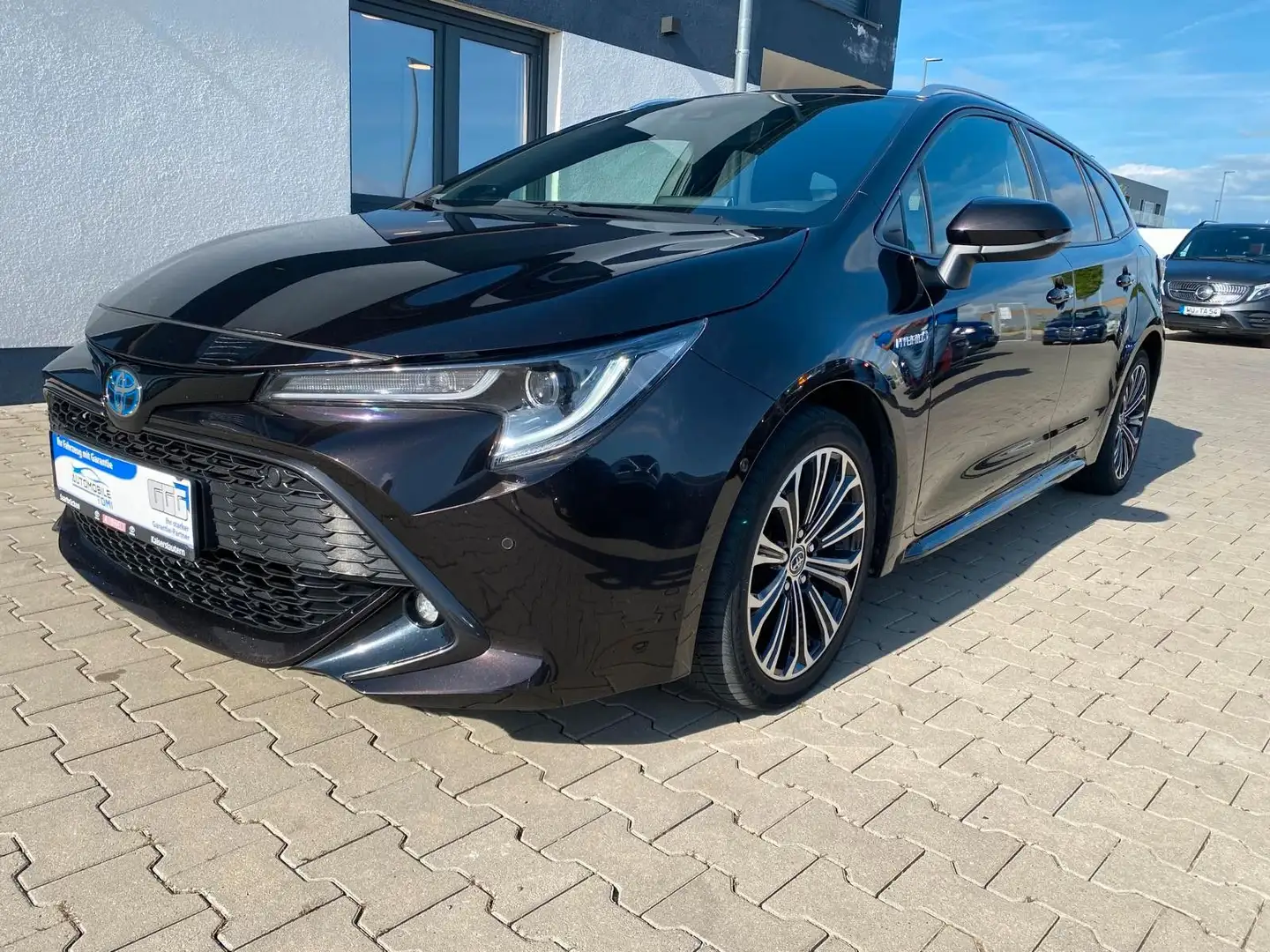 Toyota Corolla Touring Sports Hybrid Club Braun - 1