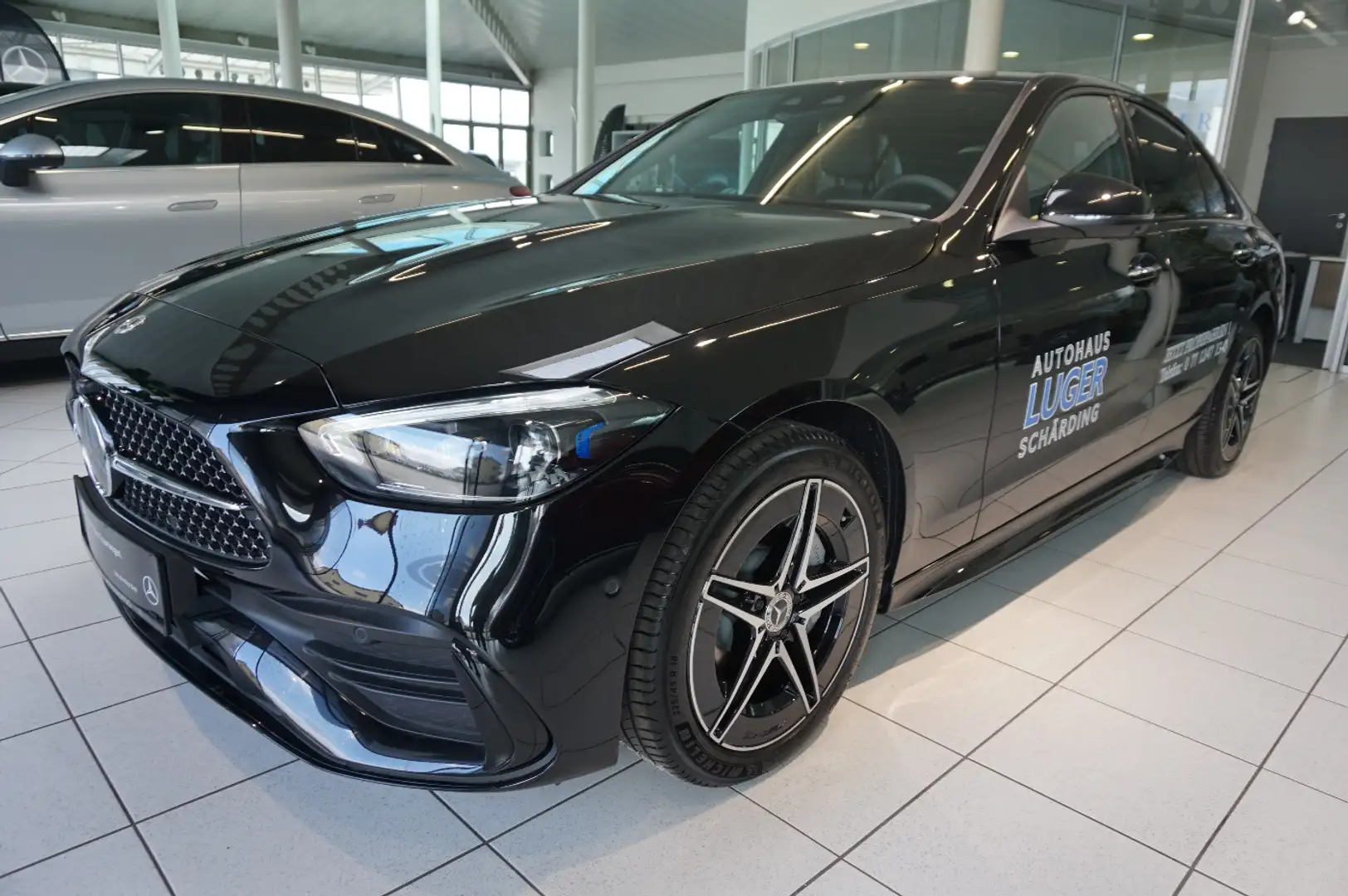 Mercedes-Benz C 300 de 4MATIC AMG Night FAP Distr MBUX Navi Zwart - 1