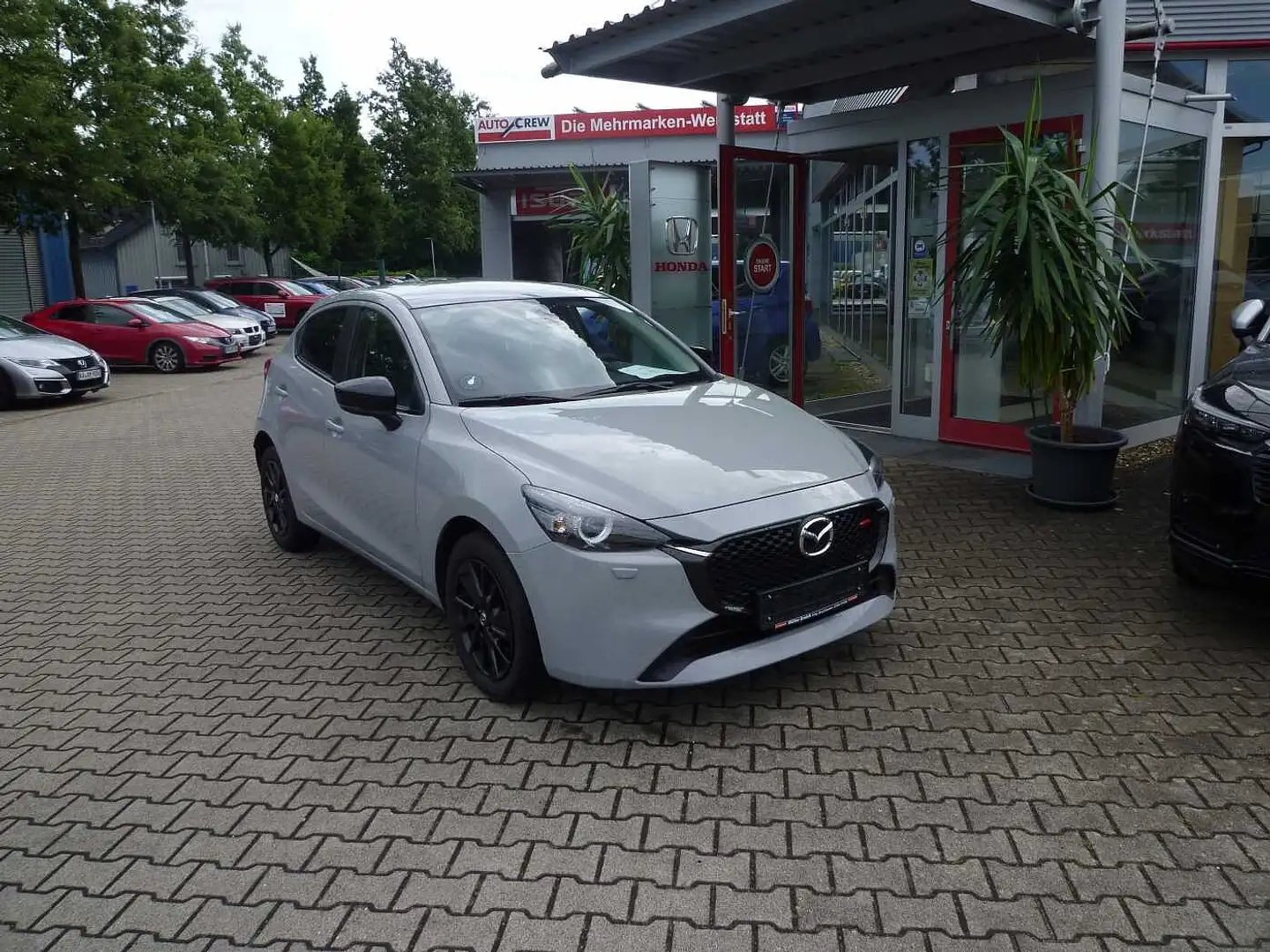 Mazda 2 2 e-SKYACTIV G 90 M HYBRID Homura Grijs - 1