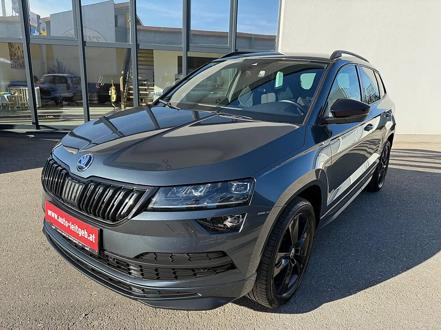 Skoda Karoq 2.0 TSI SportLine 4x4 OPF (EURO 6d-TEMP) Grau - 1