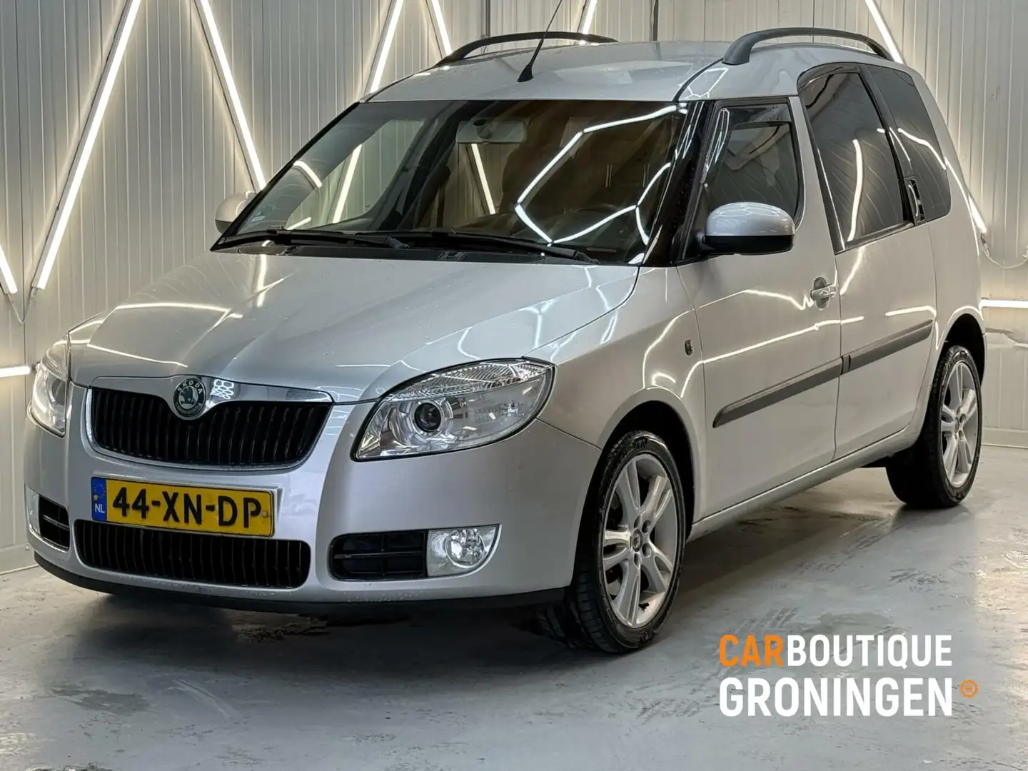 Skoda Roomster 1.6-16V | 2e EIGENAAR | PDC | TREKHAAK | NAVI Grijs - 1
