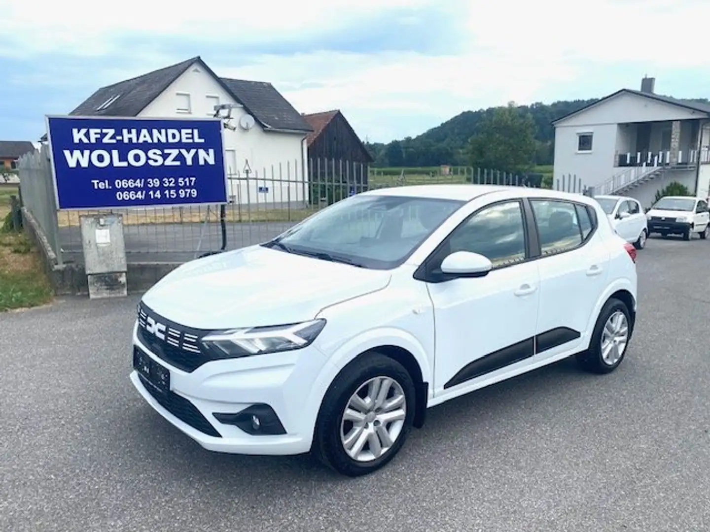 Dacia Sandero Expression SCe 65 NUR 18tkm !1BESITZ WERKSGARANTIE Weiß - 1