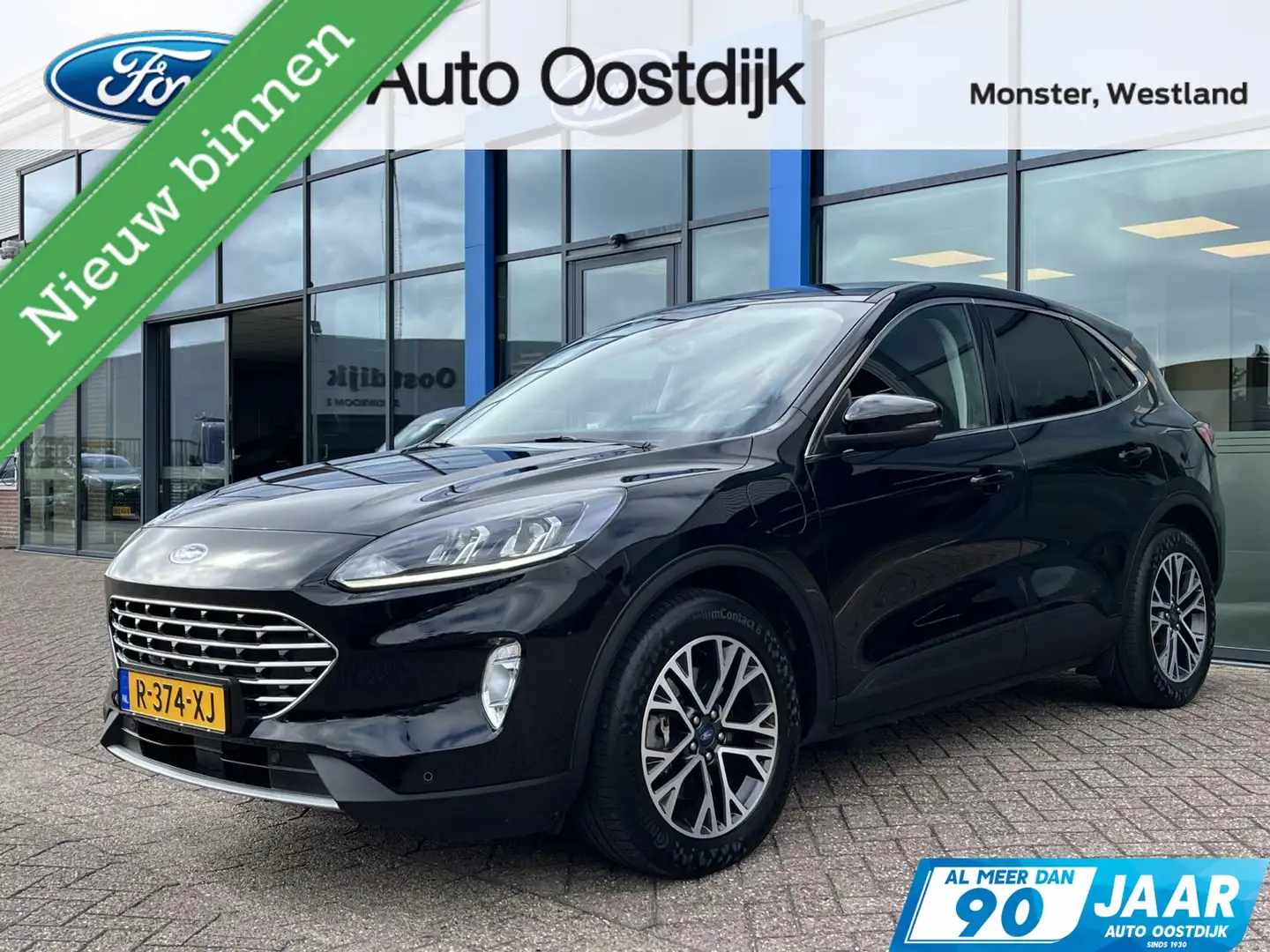 Ford Kuga 2.5 PHEV Titanium 225PK Winterpack Climate Cruise Zwart - 1