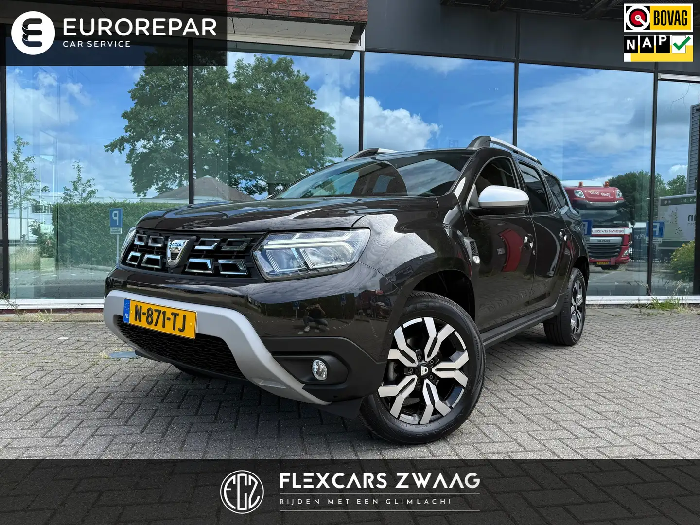 Dacia Duster 1.0 TCe Bi-Fuel Prestige - Navi - Climate - Parkee Zwart - 1