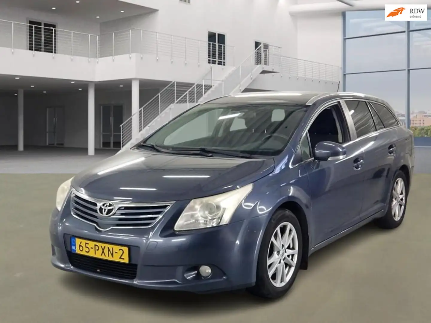 Toyota Avensis Wagon 2.2 D-4D Business NAVI CRUISE TREKHAAK 2 X S Blauw - 1