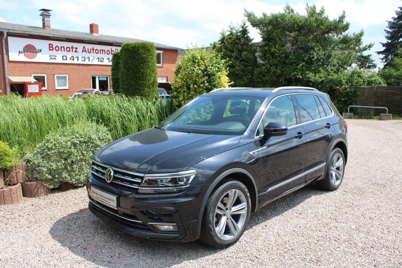 Volkswagen Tiguan 2.0 TDI 4x4 DSG High R-Line *AHK,Leder,Navi,SHZ* Schwarz - 1