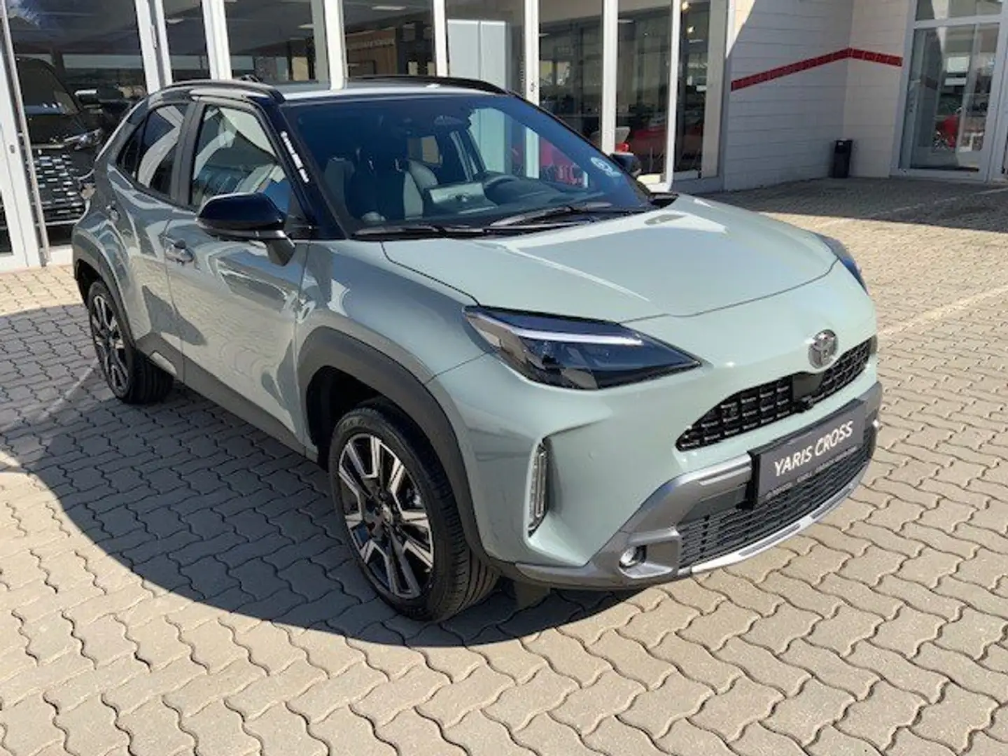 Toyota Yaris Cross Hybrid AWD-i Style Panoramaglasdach Advanced Paket Grün - 1