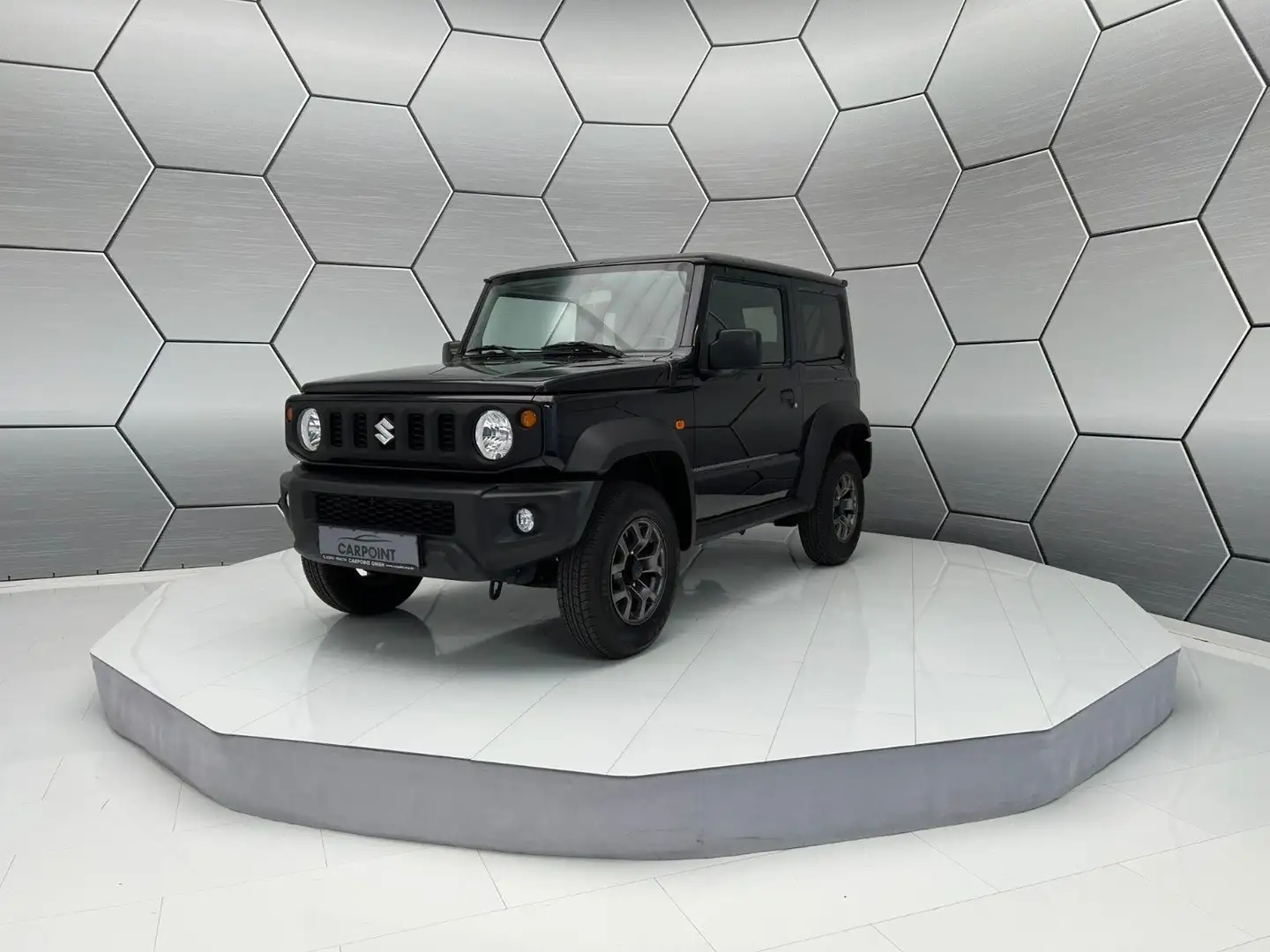 Suzuki Jimny Comfort 4x4 Klima Touchscreen 4-Sitzer PKW crna - 1