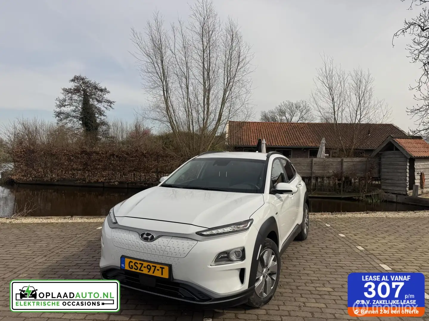 Hyundai KONA EV 64 kWh Style | Stoelverwarming | Onderhouden Bianco - 1