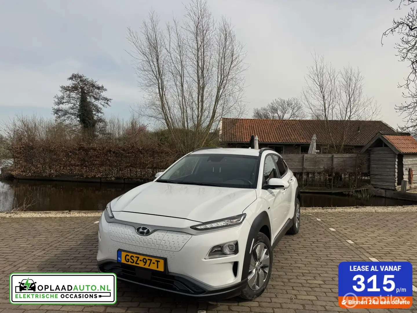 Hyundai KONA EV 64 kWh Style | Camera | Garantie Wit - 1