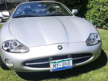 Platinum Silver w. Black soft-top Roof