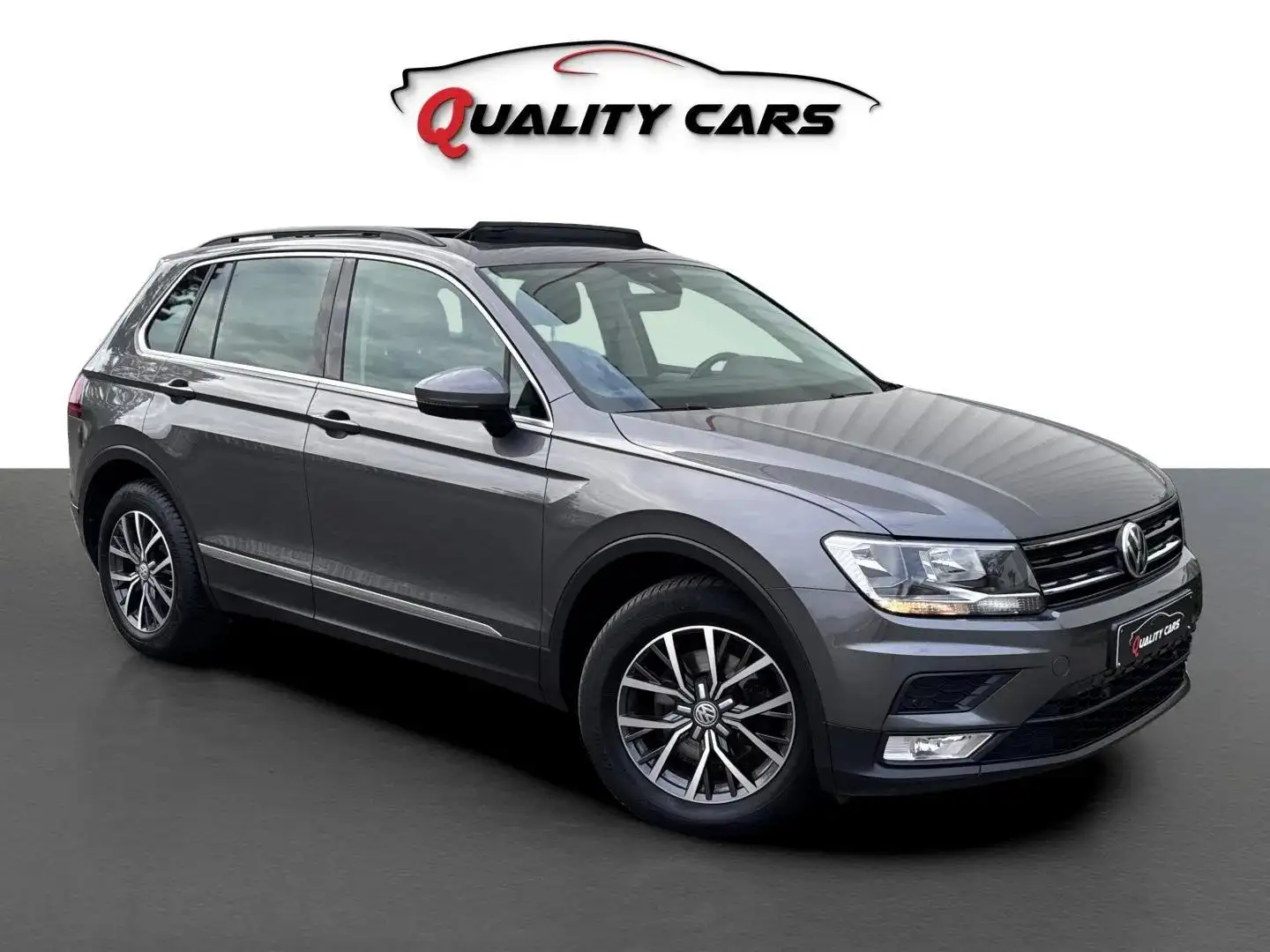 Volkswagen Tiguan 2.0 SCR TDI | 150 PK | 125.000 KM | Open dak Gris - 1