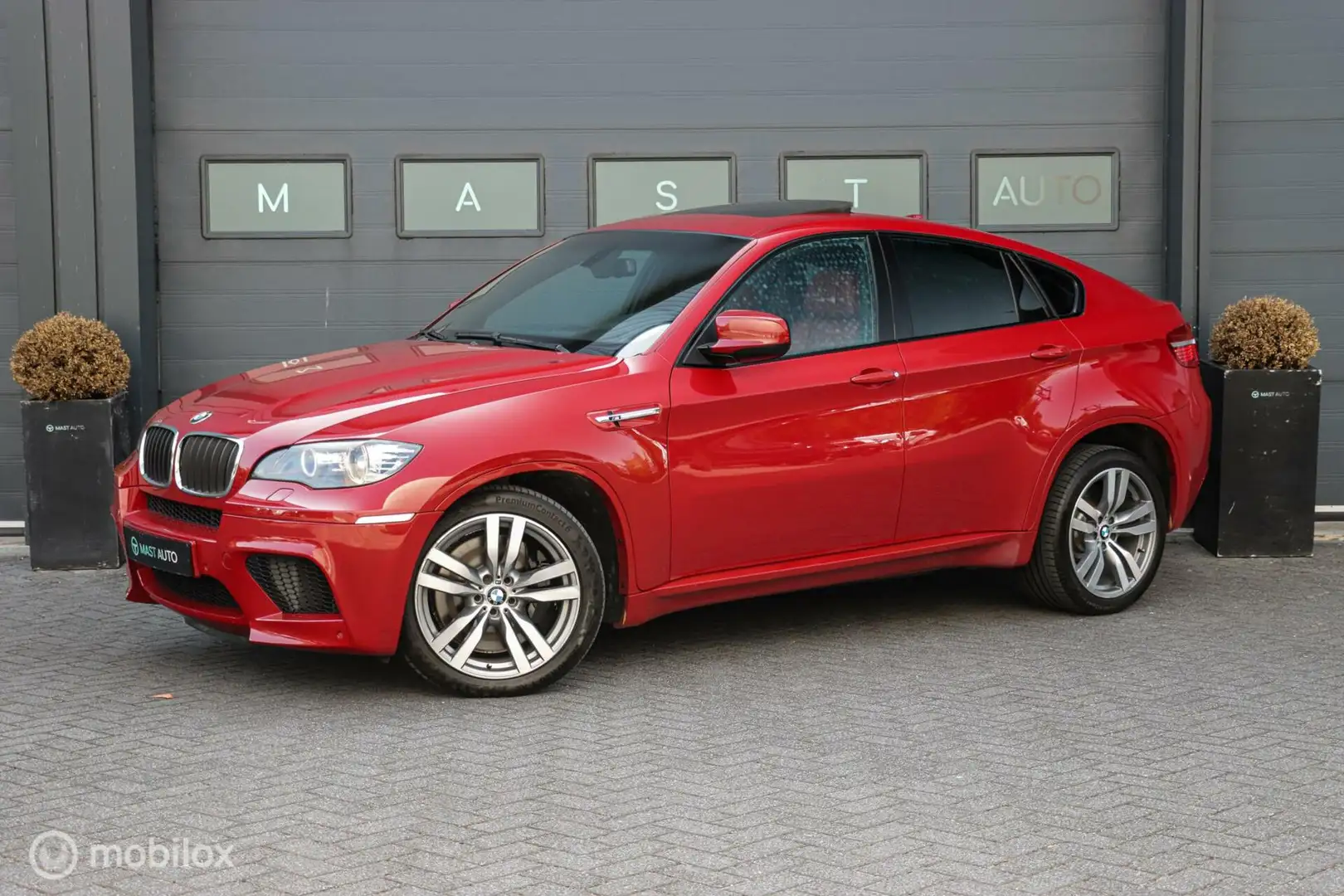 BMW X6 4.4i M | Pano | Carbon | Soft close | Leder | Navi Rood - 1