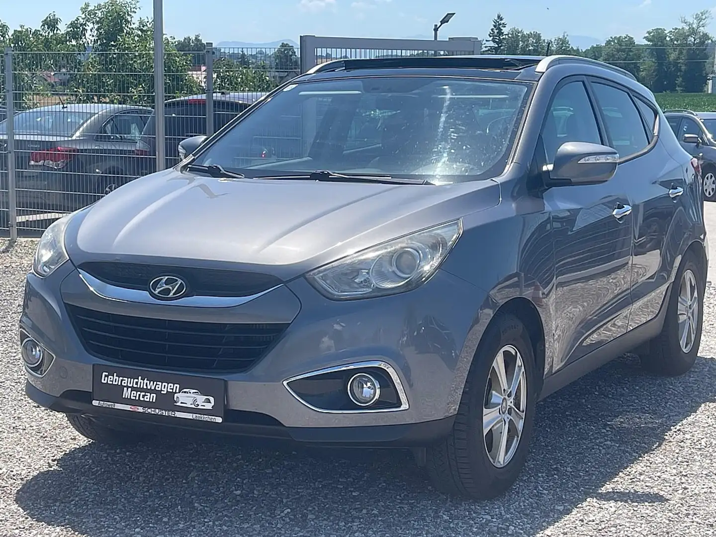 Hyundai iX35 2,0 CRDi Premium 4WD DPF Aut. Grau - 1