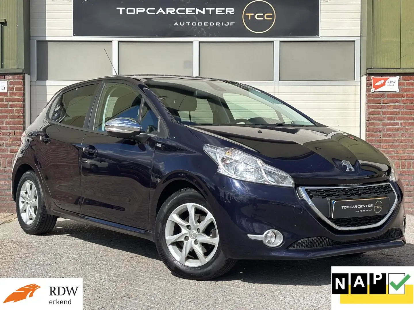 Peugeot 208 1.2 Style Pack Plus/PARKS/NAVI/CRUISE/APK/NAP Blau - 1