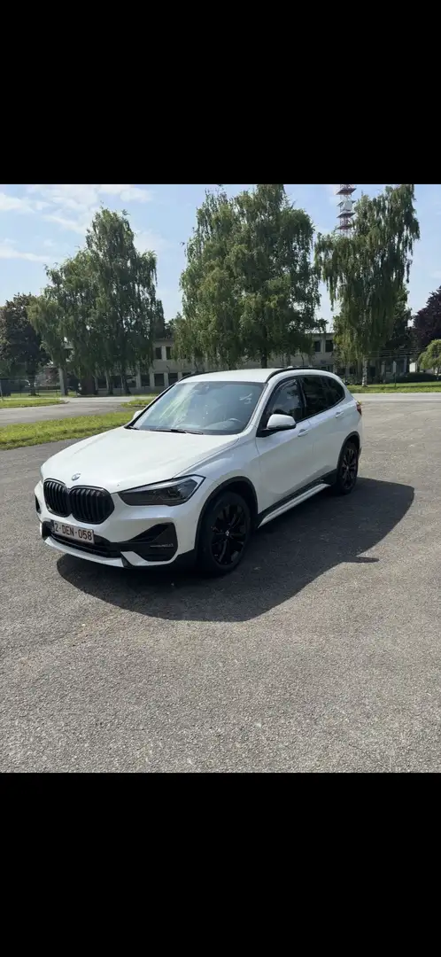 BMW X1 sDrive18i Aut. Sport Line Wit - 1