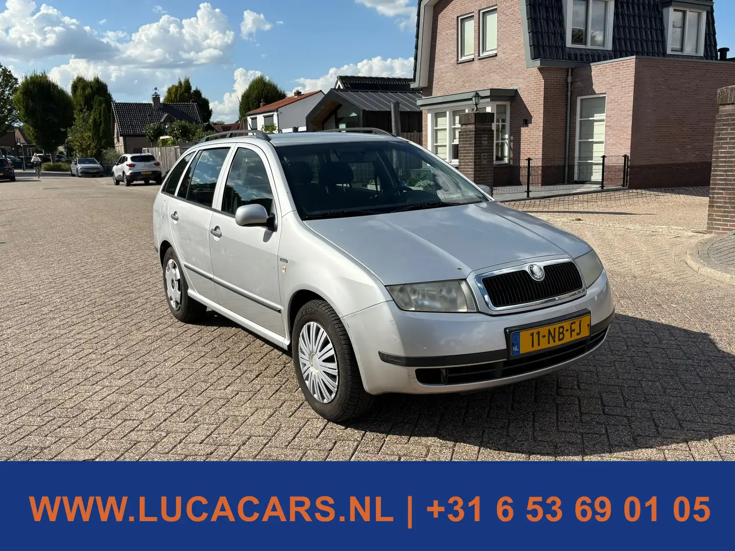 Skoda Fabia Combi 1.4-16V Creation NIEUWE APK! TREKHAAK! Grijs - 2