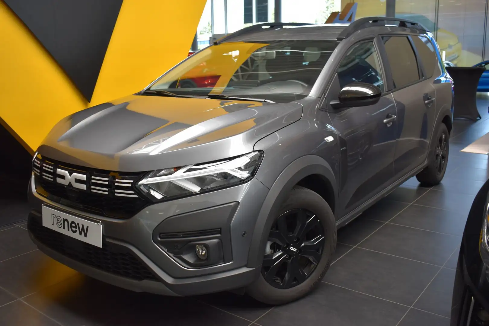 Dacia Jogger Extreme Hybrid AUT 5pk / Valckenier Gent Gris - 1