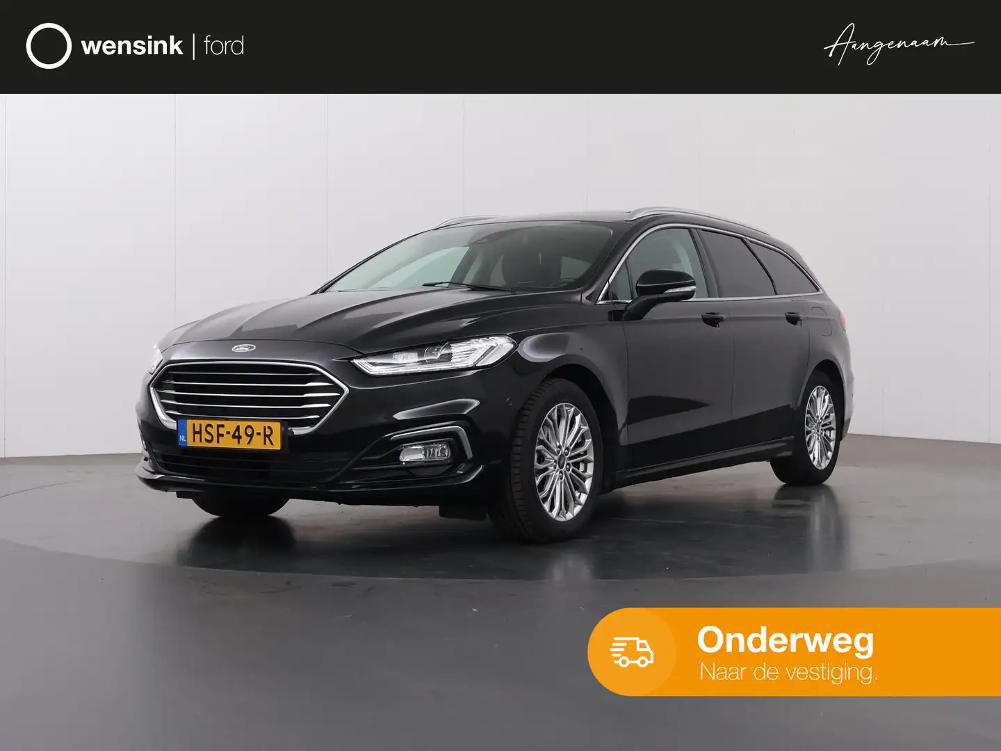 Ford Mondeo Wagon 2.0 IVCT HEV Titanium | Trekhaak | Panoramad Zwart - 1