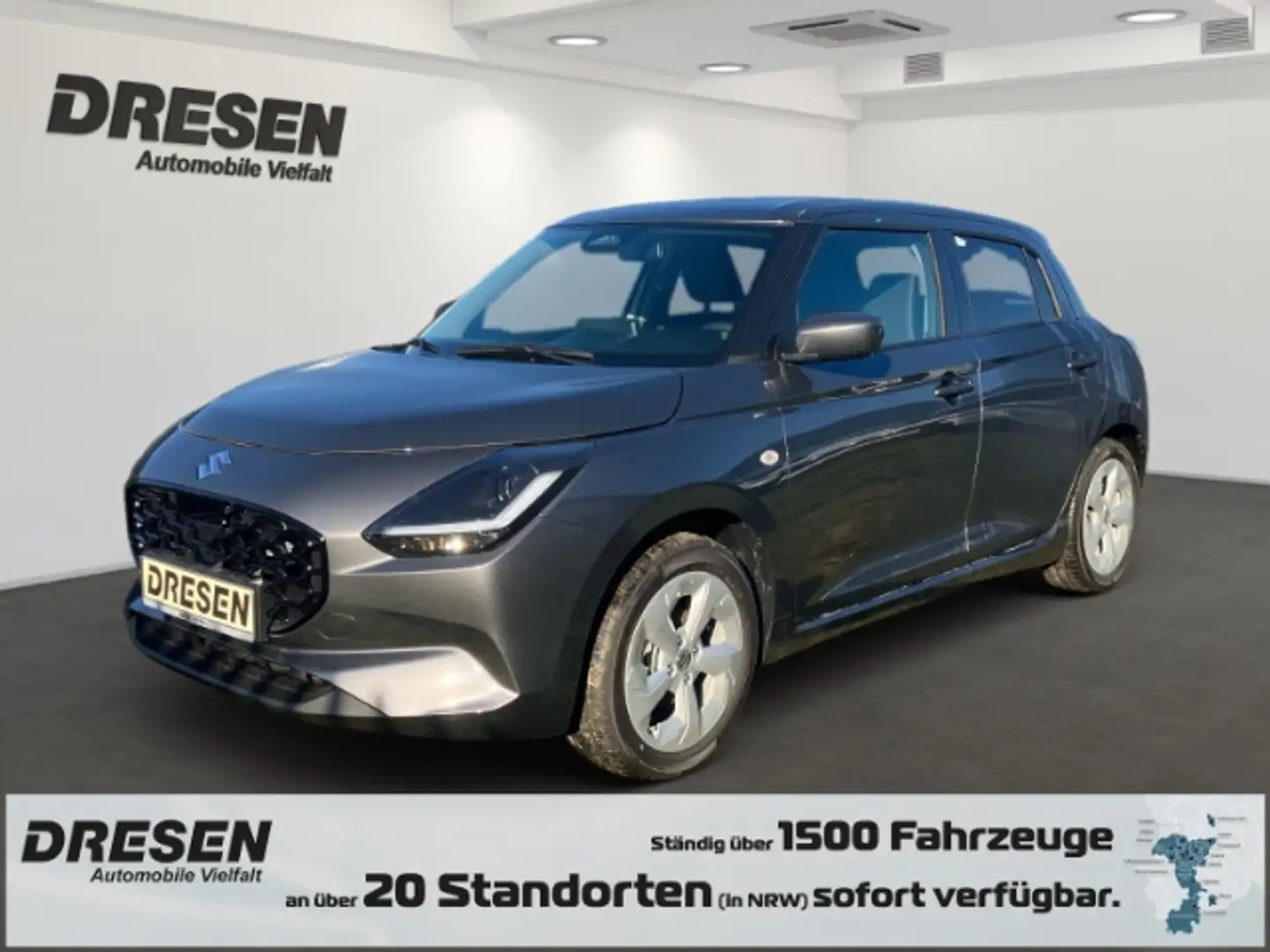 Suzuki Swift COMFORT 1.2 Navi + SH + Tempomat + Rückfahrkamera Grijs - 1