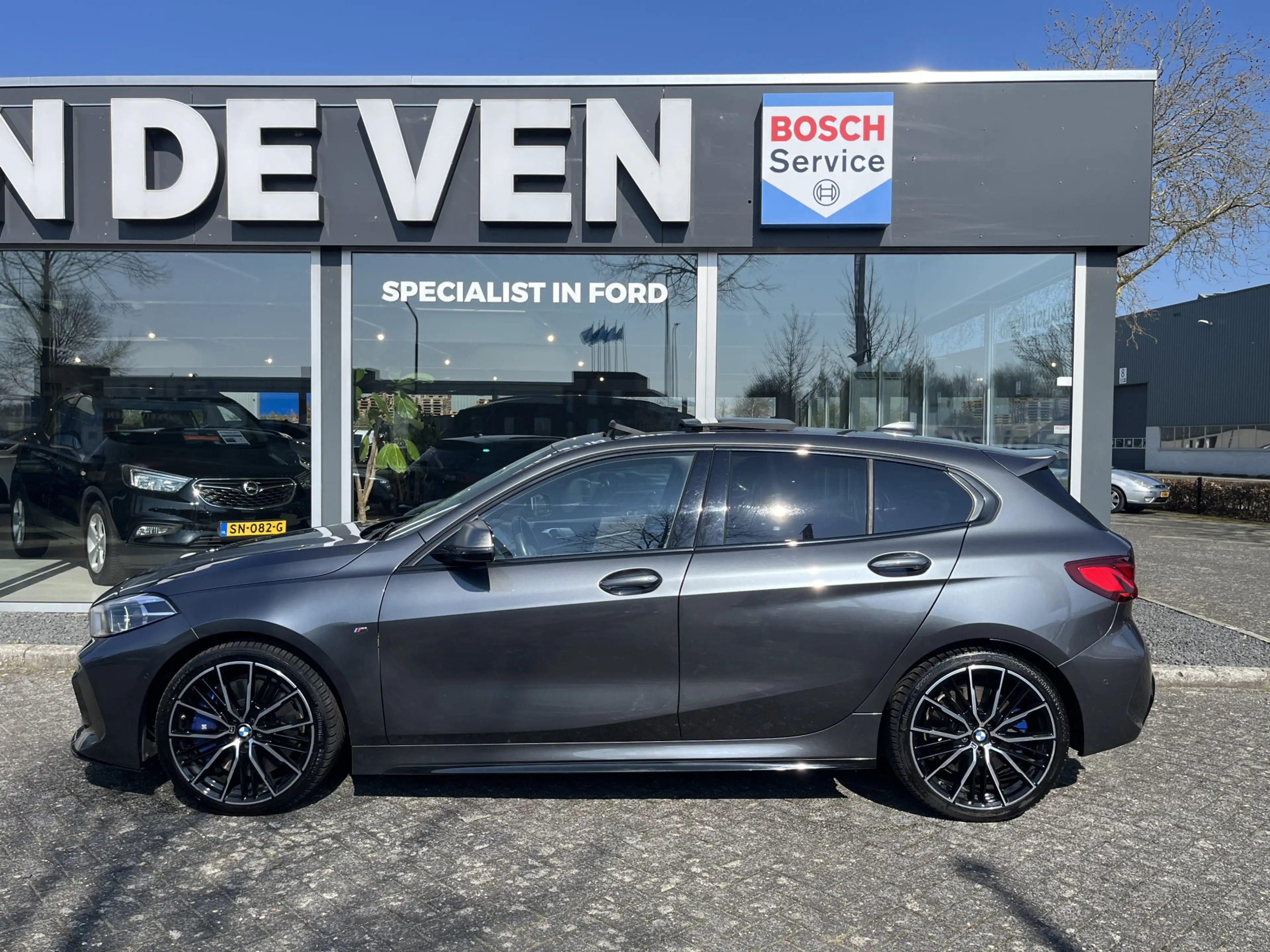 BMW 135 1-serie M135i xDrive High Executive M Sport 306pk — photo 12