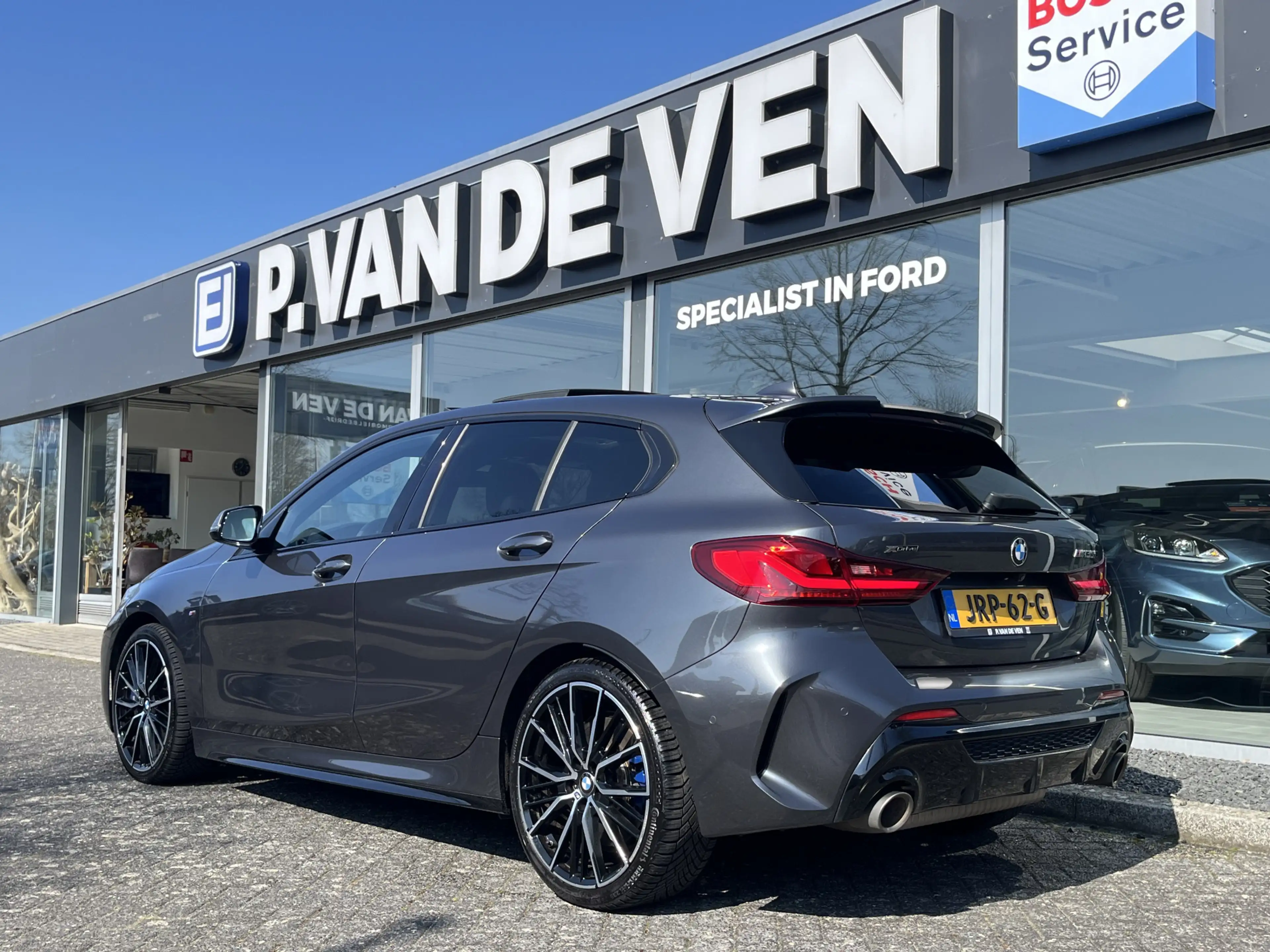 BMW 135 1-serie M135i xDrive High Executive M Sport 306pk — photo 3