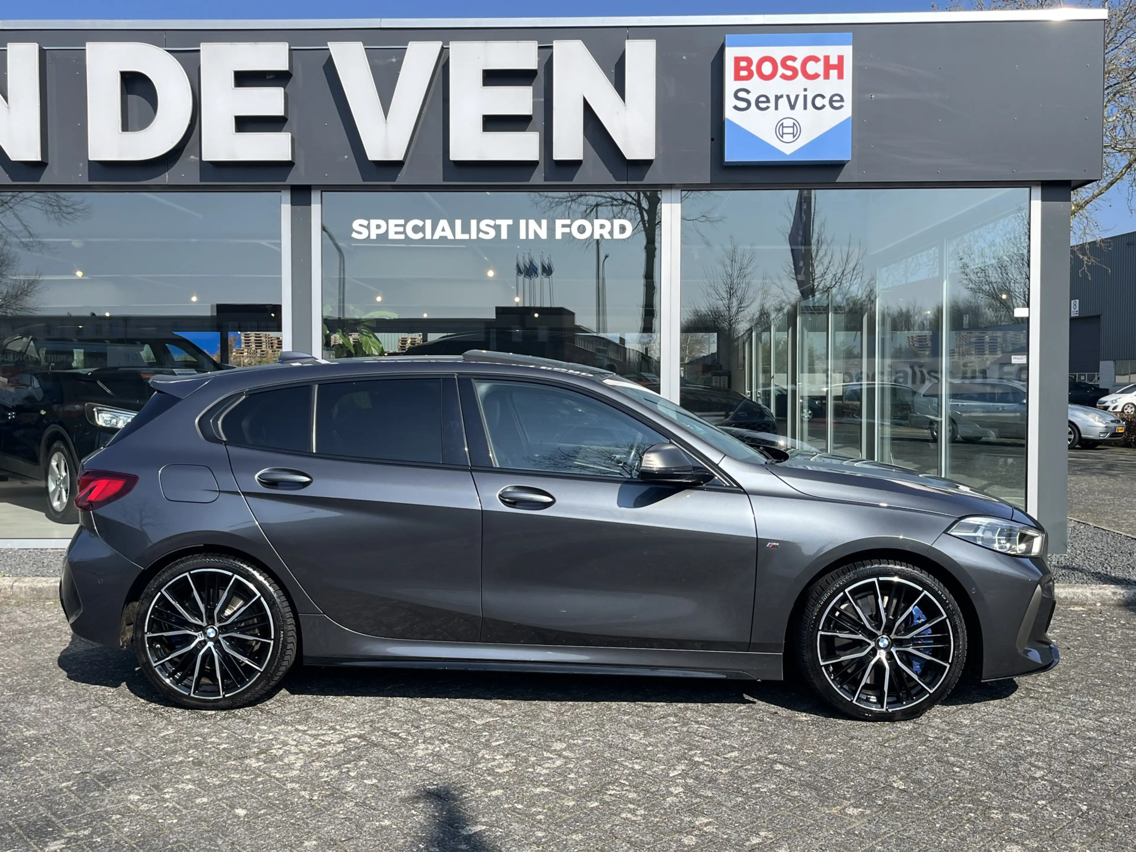 BMW 135 1-serie M135i xDrive High Executive M Sport 306pk — photo 10