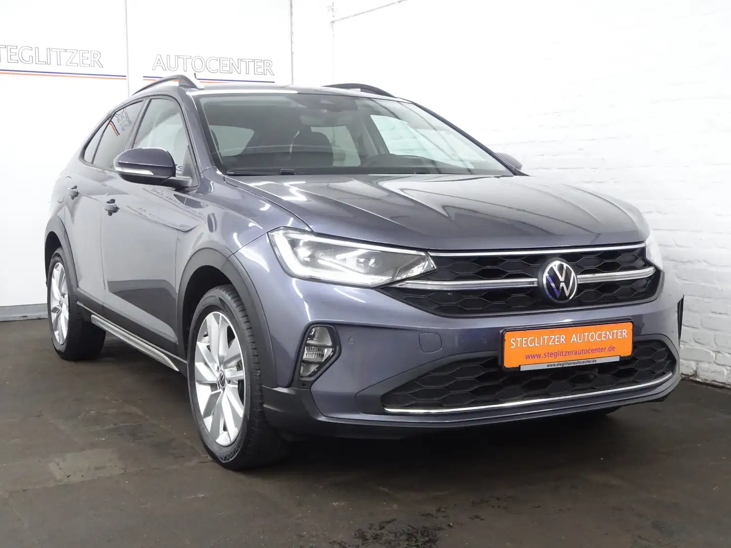 Volkswagen Taigo 1.0 TSI Life DSG ACC/AHK/Virtual/Matrix/Navi/PDC Grijs - 2