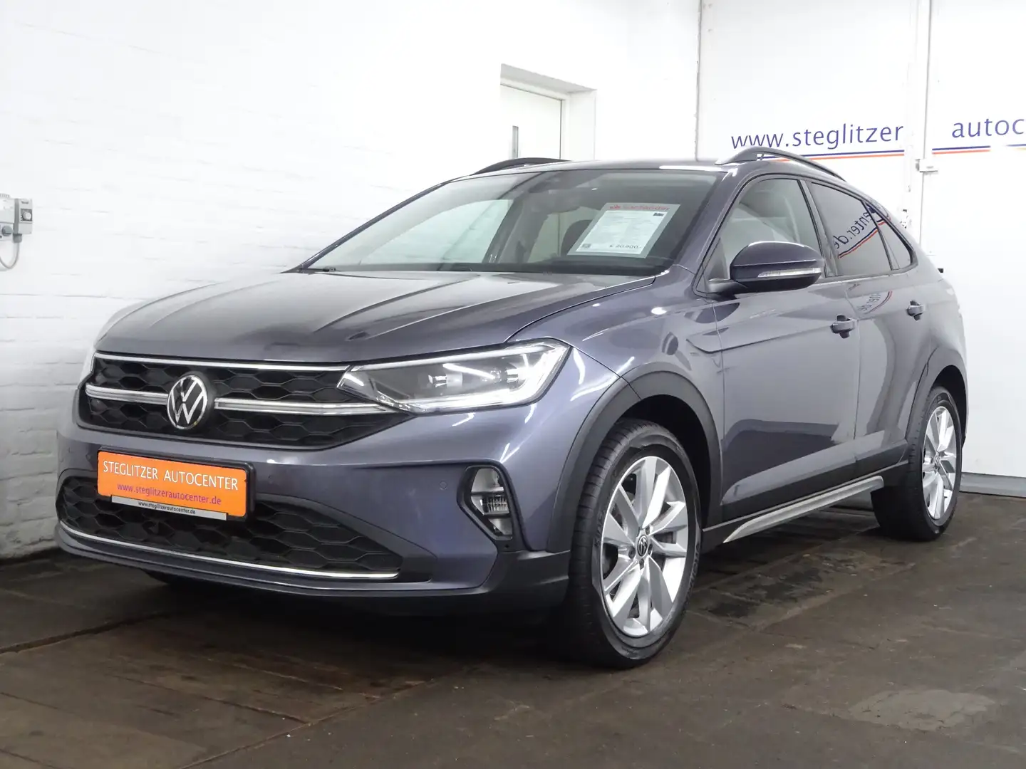 Volkswagen Taigo 1.0 TSI Life DSG ACC/AHK/Virtual/Matrix/Navi/PDC Grijs - 1