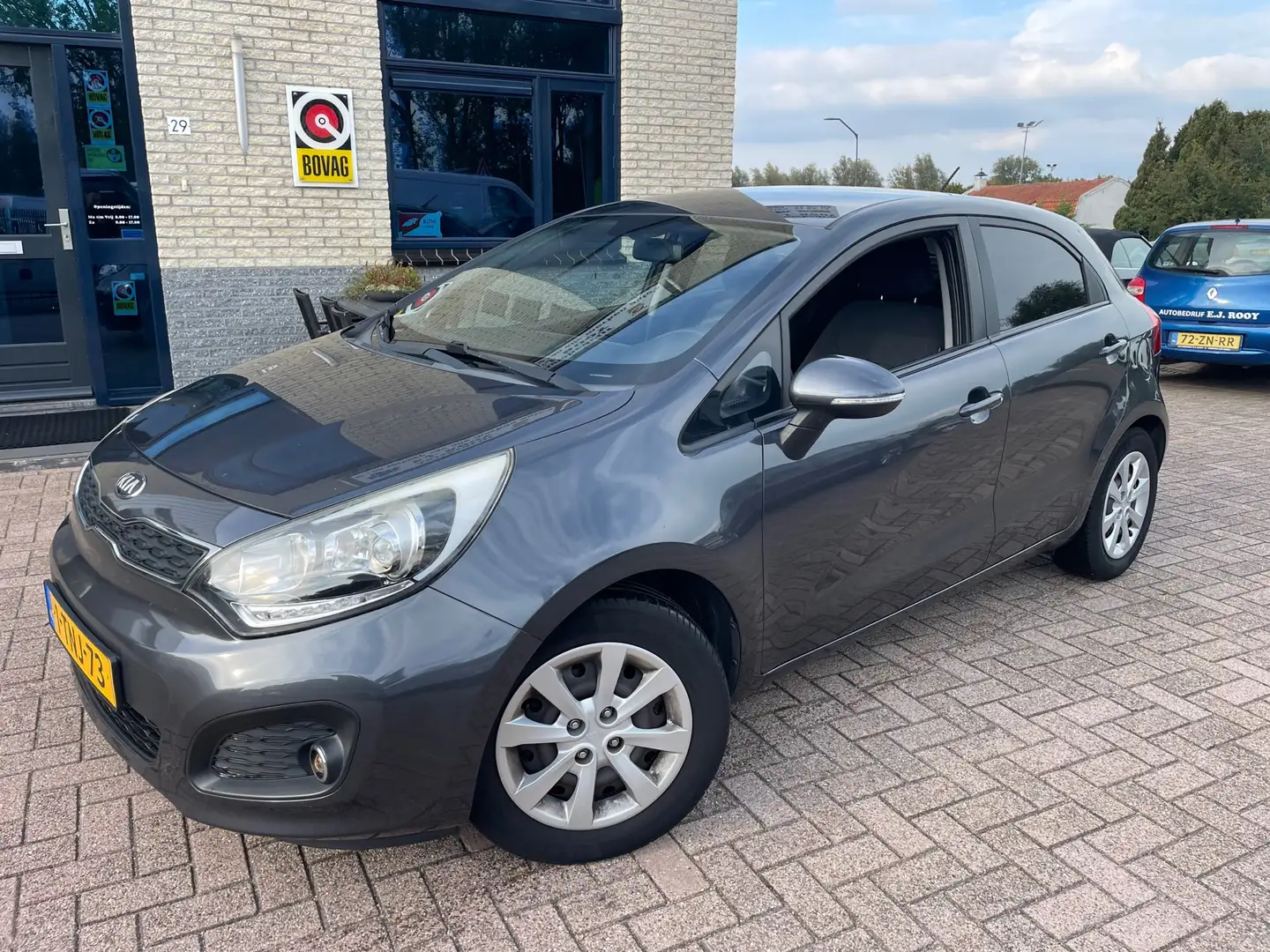 Kia Rio 1.2 CVVT Plus Pack-NAV- Bluetooth- NL auto Grijs - 1