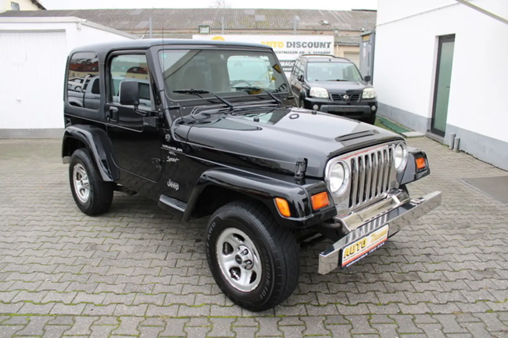 Jeep Wrangler 4.0 Sport *LPG*Soft*8-Fach-bereift* Schwarz - 1