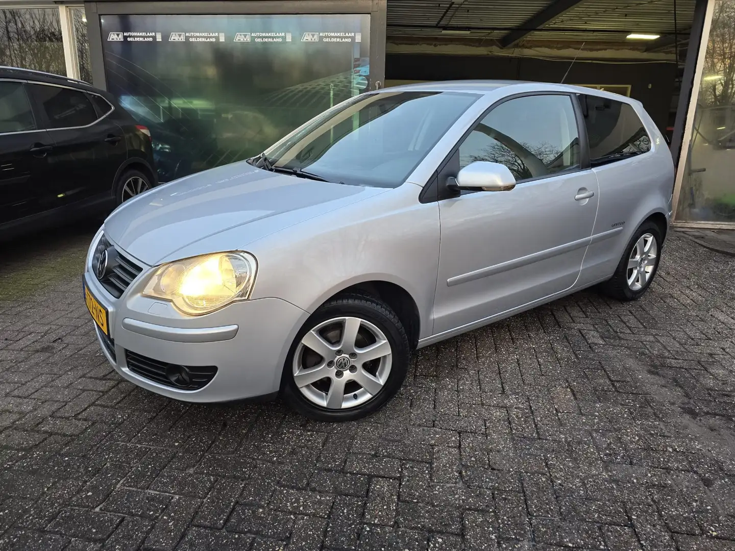 Volkswagen Polo 1.2-12V Trendline | NIEUWE APK | AIRCO | ANDROID | Grau - 1