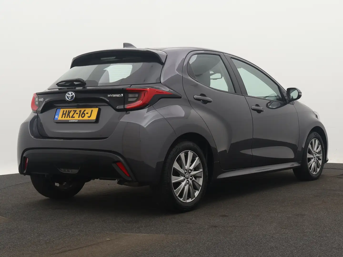 Toyota Yaris 1.5 Hybrid Business Plus Limited | LM velgen | App Gris - 2