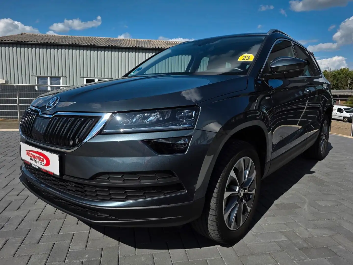 Skoda Karoq 1.5l TSI ACT DSG Clever AHK ACC Navi RFK Grau - 1