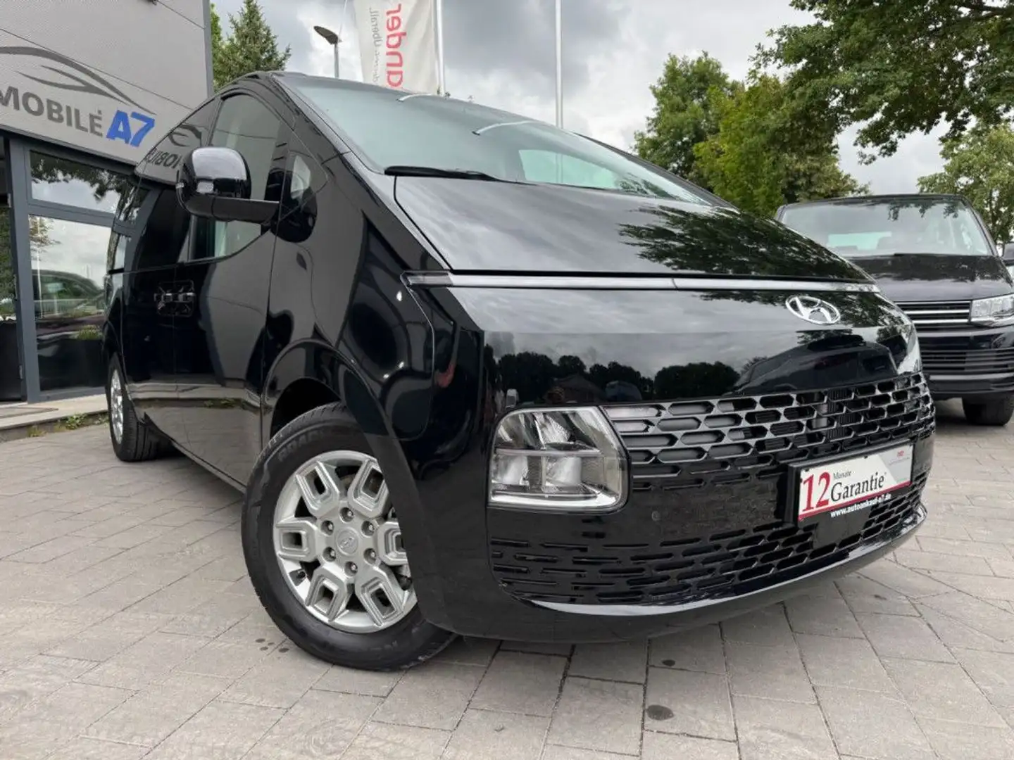 Hyundai STARIA 2.2 CRDi Allrad *9-SITZER/NAVI/KAMERA* Schwarz - 1